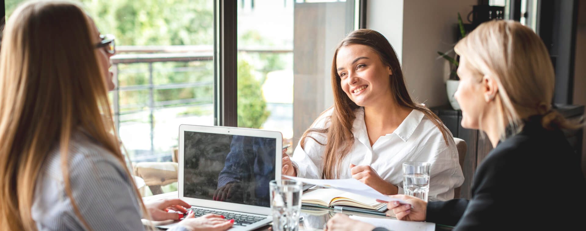A small group discussing asset finance